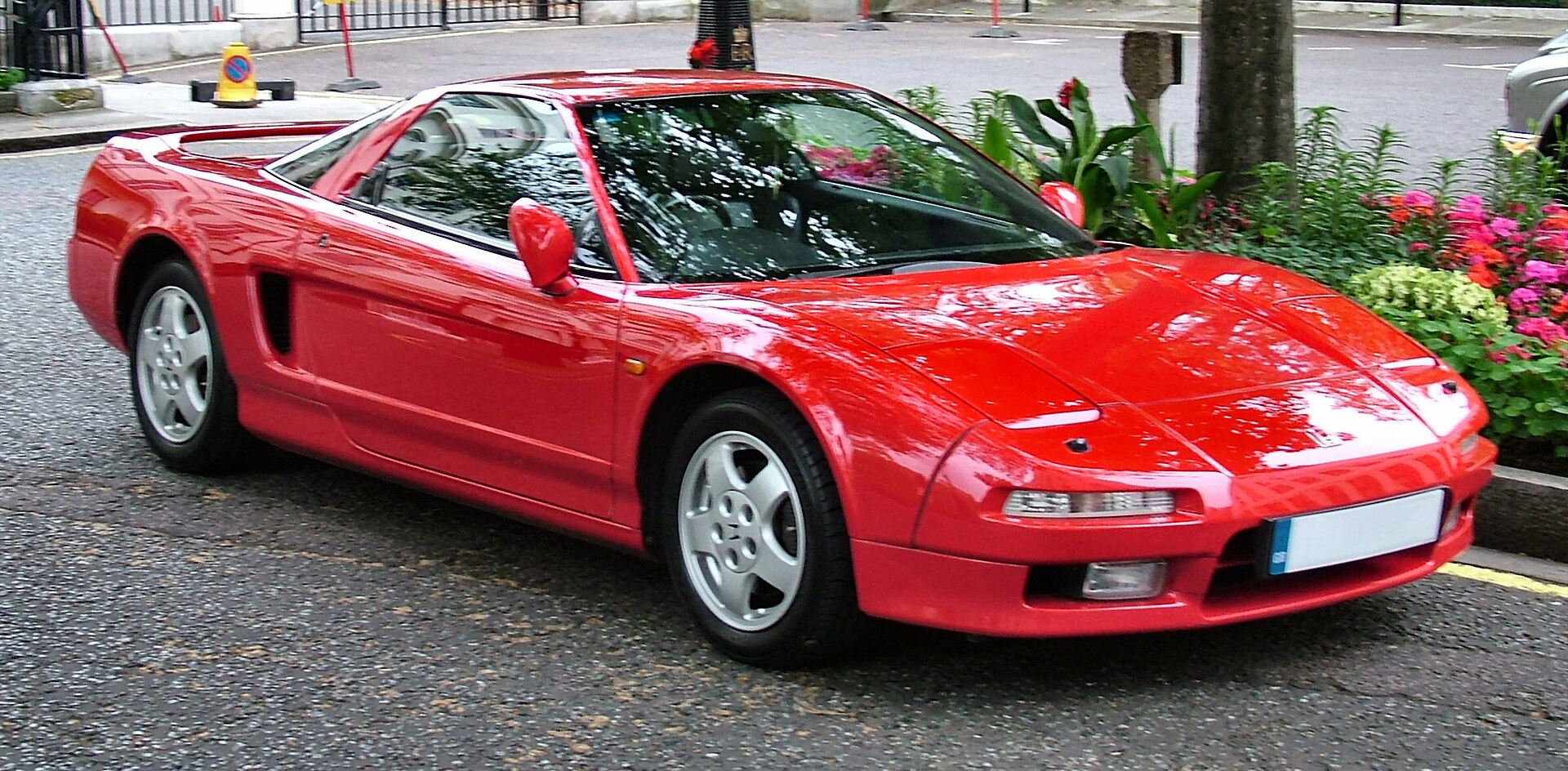 Red first-gen Honda NSX